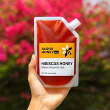 Load image into Gallery viewer, Raw Honey Infused with Hibiscus Flowers 10 oz (285 g)
